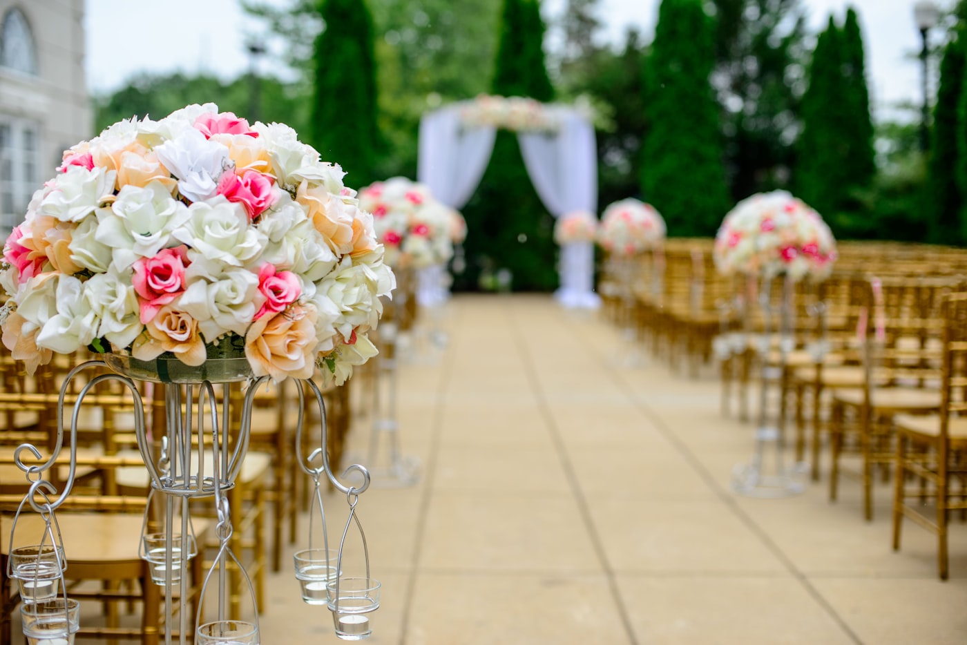 A wedding aisle lined with florals