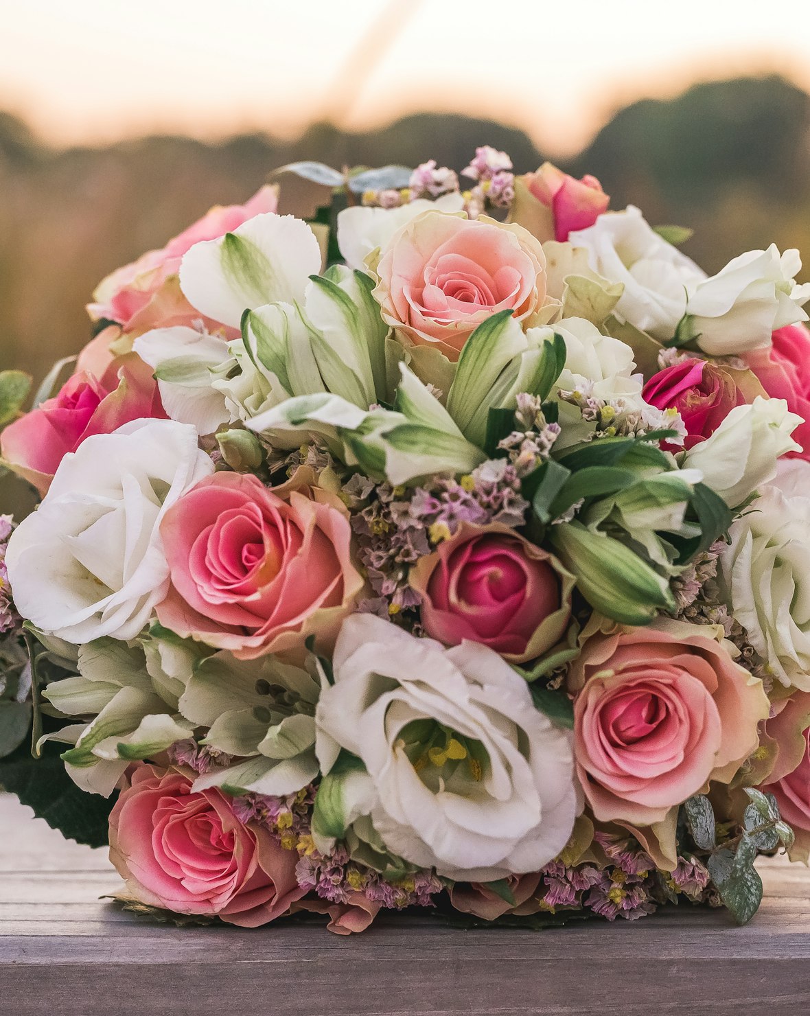 A lush blush and peach bridal bouquet