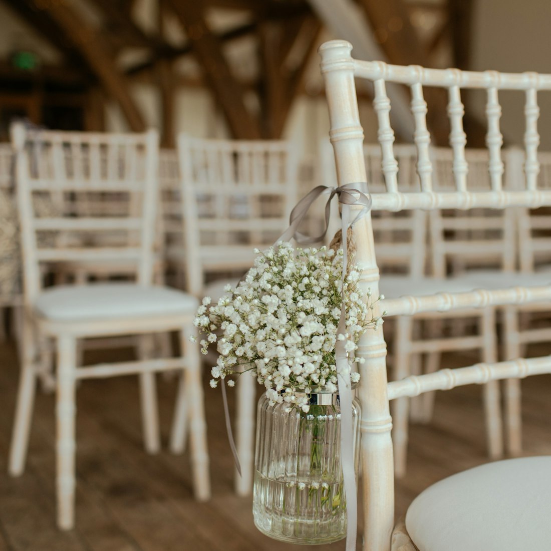 Warm string lights glowing over a wedding reception